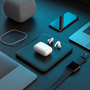Flat-lay of trending electronics and smart gadgets including wireless earbuds, smartwatch, and mobile accessories on a modern workspace